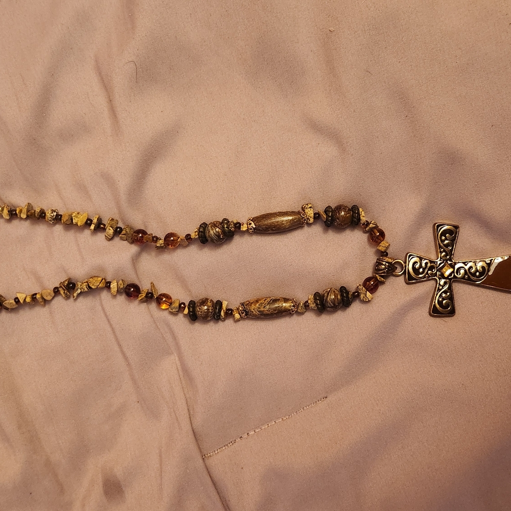 Neutral Beaded Necklace with Cross Pendant and Decorative Elements